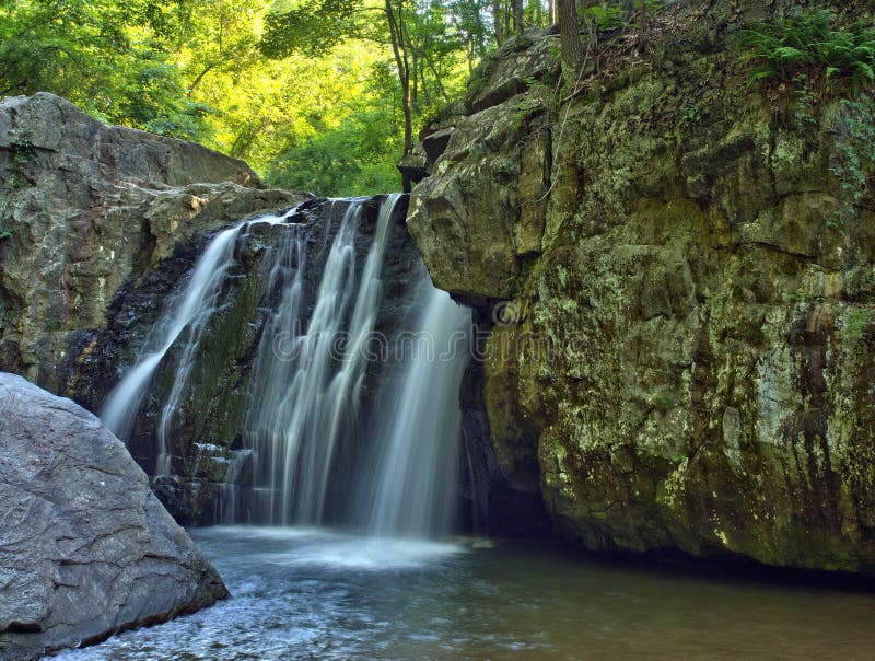 Kilgore Falls in Rocks State Park, Maryland. Kilgore Falls, the second highest vertical waterfall in Maryland and featured in the Disney movie `Tuck Everlasting stock photography Kilgore Falls in Rocks State Park, Maryland. Kilgore Falls, the second highest vertical waterfall in Maryland and featured in the Disney movie `Tuck Everlasting stock photography
