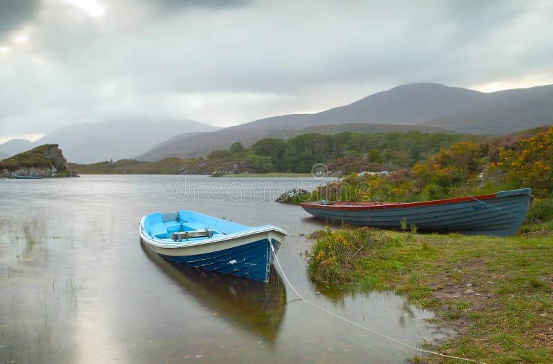 Boat at the Killarney lake stock photo. Image of natural 24865012