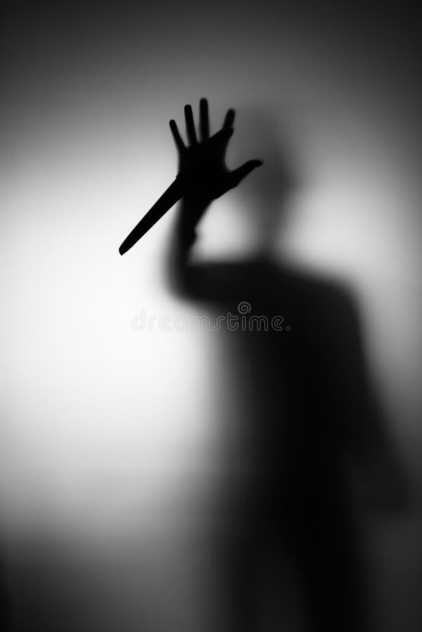 Silhouette Unknown Shadow Figure On Door Foto stock 1906363000