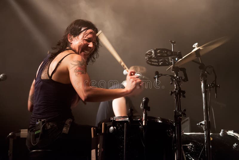BARCELONA - APR 2: Kim Schifino, drummer of Matt and Kim band, performs at Apolo on April 2, 2011 in Barcelona, Spain. BARCELONA - APR 2: Kim Schifino, drummer of Matt and Kim band, performs at Apolo on April 2, 2011 in Barcelona, Spain.
