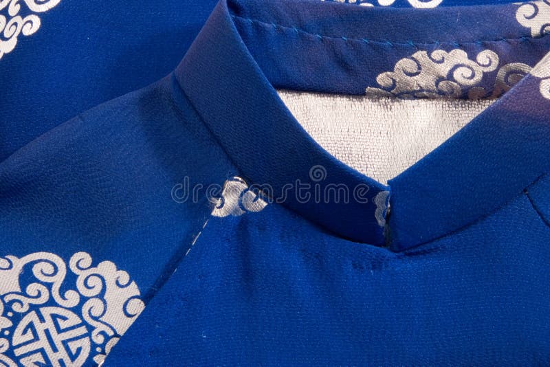 Close up with detail of kimono collar and hand stitching; detail of an older less industrial craft. Button clasp stock images, royalty-free photos and pictures