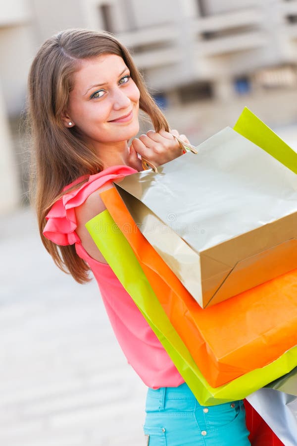 Kind Lady With Shopping Bags