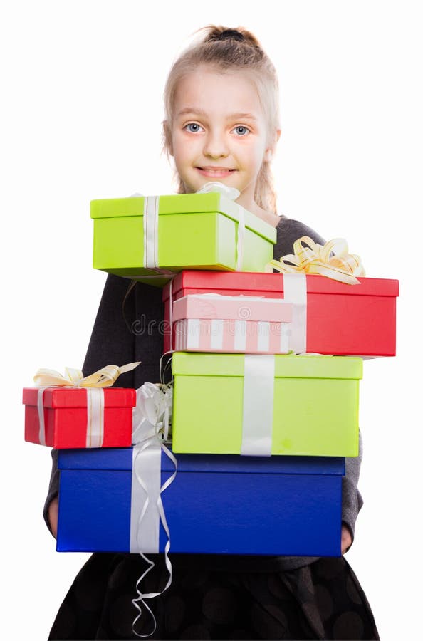 Kind met heel wat giftdozen in handen op geïsoleerde achtergrond royalty-vrije stock afbeeldingen Kind met heel wat giftdozen in handen op geïsoleerde achtergrond royalty-vrije stock afbeeldingen