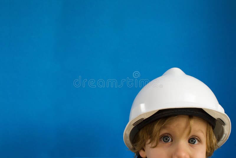 Kind mit Schutzhelm lizenzfreies stockfoto Kind mit Schutzhelm lizenzfreies stockfoto