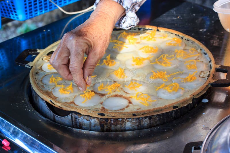 Kind of thai sweetmeat, Sweet and Savory Grilled Coconut-Rice. Hotcakes it`s for kanom krok but sometiems they use Coconut Rice Cake,Thai Coconut pudding too royalty free stock image Kind of thai sweetmeat, Sweet and Savory Grilled Coconut-Rice. Hotcakes it`s for kanom krok but sometiems they use Coconut Rice Cake,Thai Coconut pudding too royalty free stock image