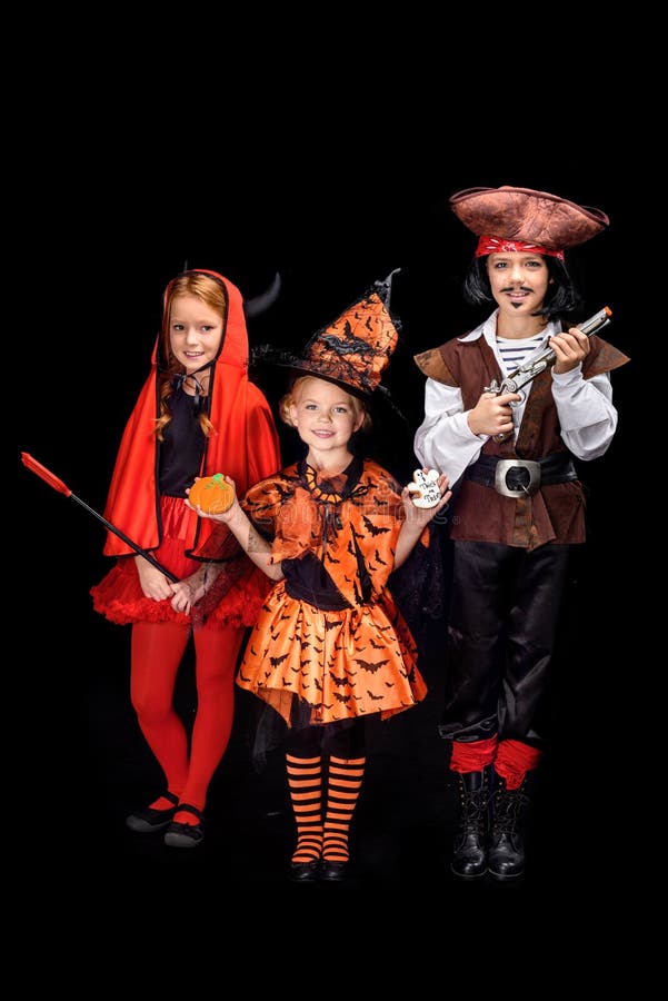 Kinder in Halloween-Kostümen lizenzfreie stockbilder Kinder in Halloween-Kostümen lizenzfreie stockbilder