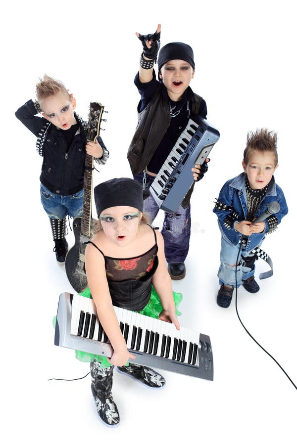 Group of children singing in heavy metal style. Shot in a studio. Isolated over white background. Group of children singing in heavy metal style. Shot in a studio. Isolated over white background.