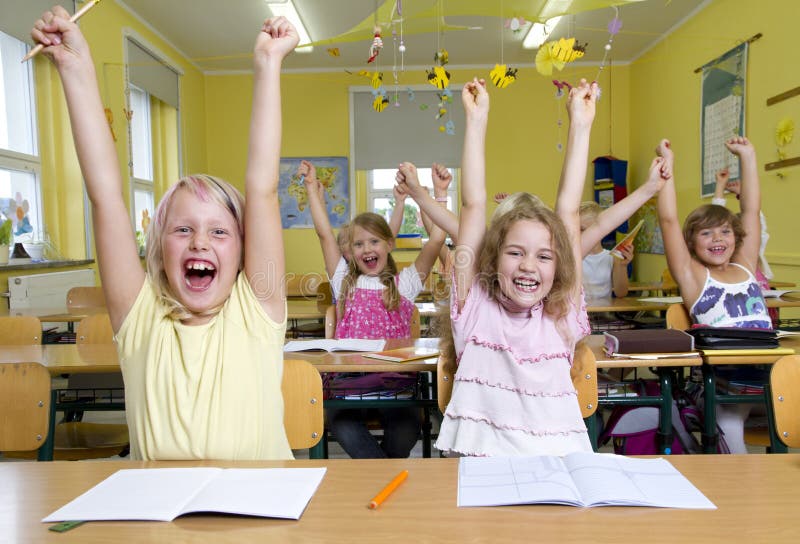 Children in a yellow classroom. They all raises up the hands. Children in a yellow classroom. They all raises up the hands.