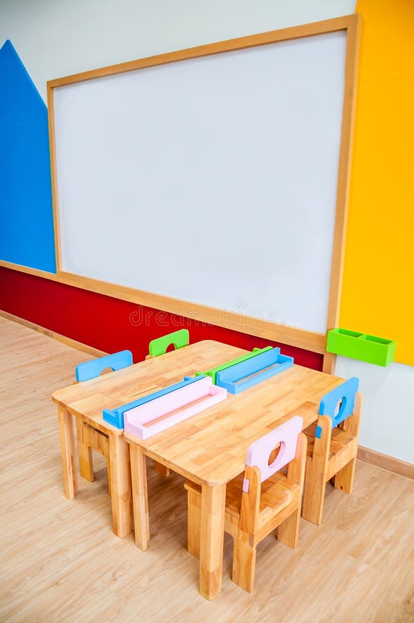 Interior of Kindergarten Classroom Consist Desks and Chairs Stock Image