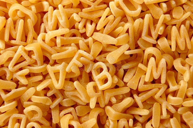 Kindzeichen-Teigwarenhintergrund lizenzfreie stockfotos Kindzeichen-Teigwarenhintergrund lizenzfreie stockfotos
