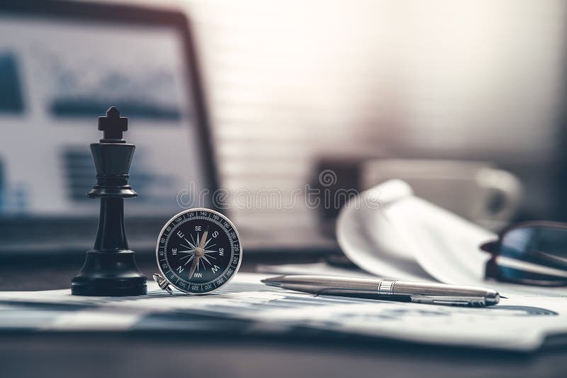 Chess Navigation Compass On Chessboard Concept Stock Photo