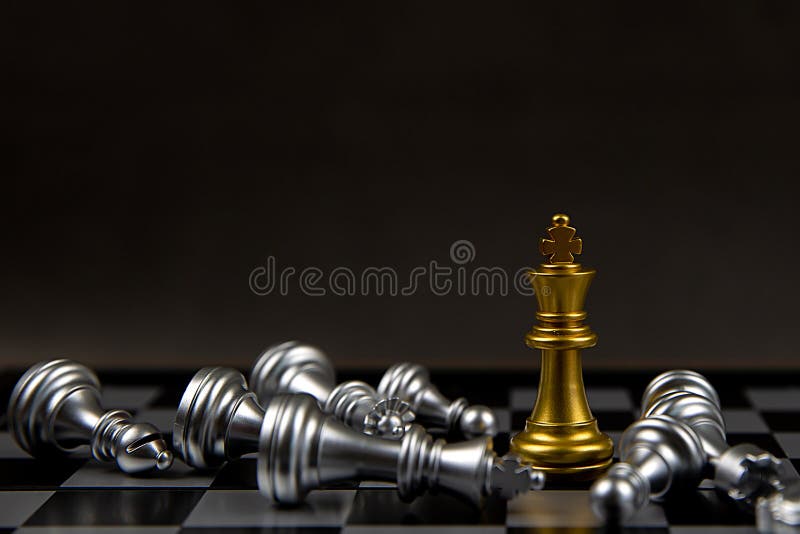 Premium Photo, Golden king chess is last standing in the chess board