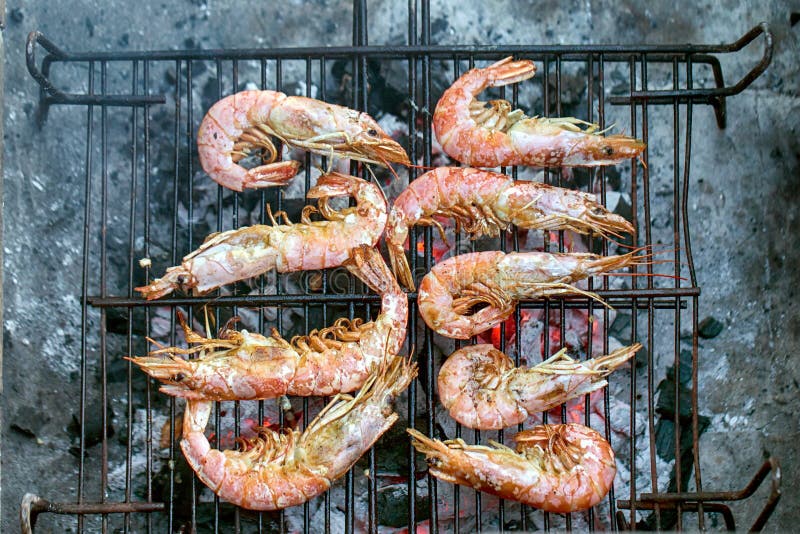 King prawns on a grill stock image. Image of meal, pork 145021075