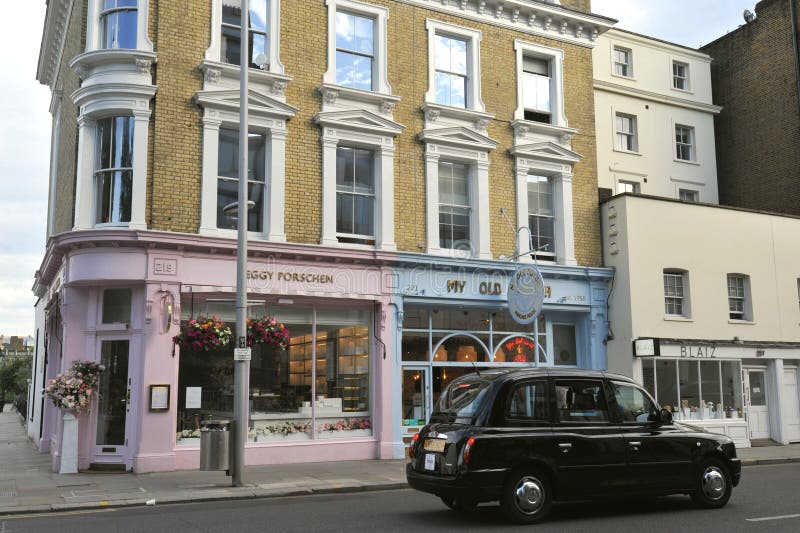 Row of Shops on Sloane Street in Sloane Square, London, UK, People
