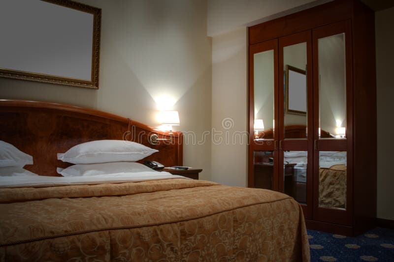 King-size Bed With Bedside Table And Wardrobe Stock Photo ...