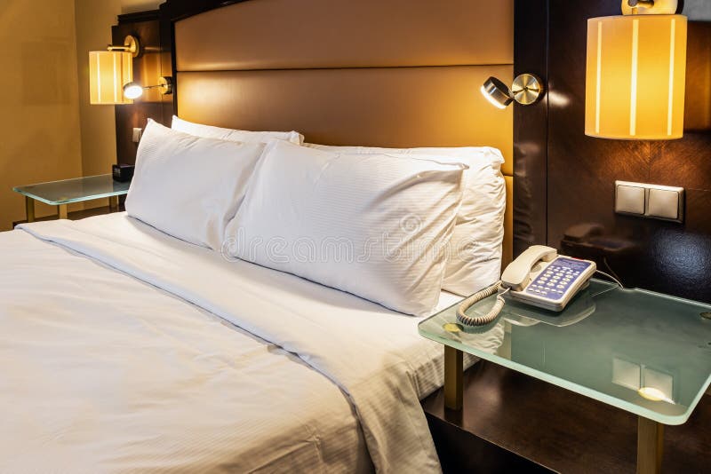 King Size Bed in the Hotel Room Made for Meeting Guests Stock Image