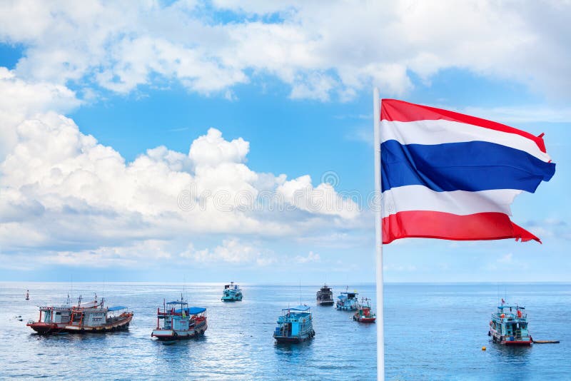 The Kingdom of Thailand flag, sea port, boats, ships, sky, clouds beautiful background, flag on pole waves on wind, state symbol stock image The Kingdom of Thailand flag, sea port, boats, ships, sky, clouds beautiful background, flag on pole waves on wind, state symbol stock image