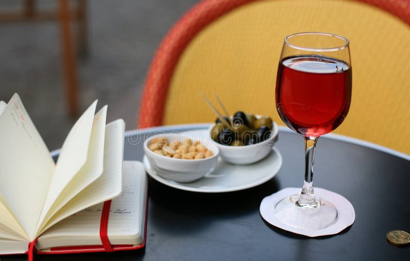 Kir cassis, nibbles and and personal organizer