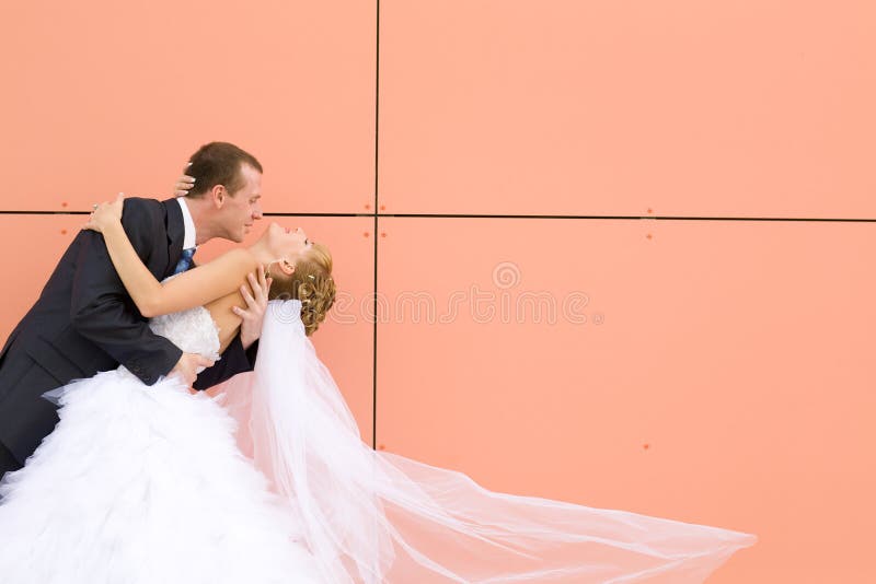 Kiss of bride and groom