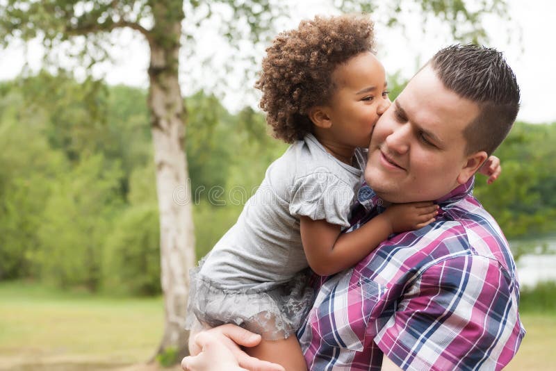 Kiss from the girl to her dad