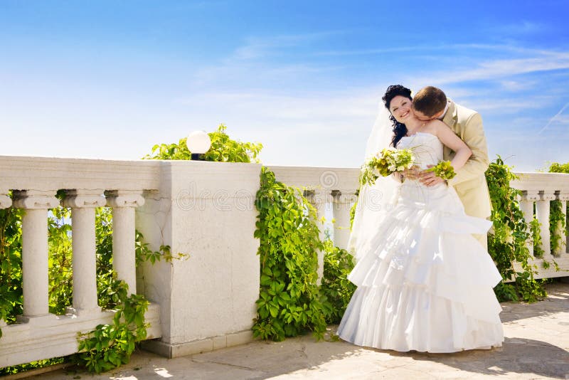 Kiss near the fence