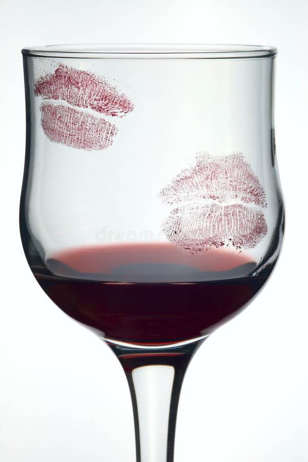 Kisses on glass with wine