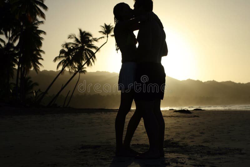 Kissing Couple by Sunset