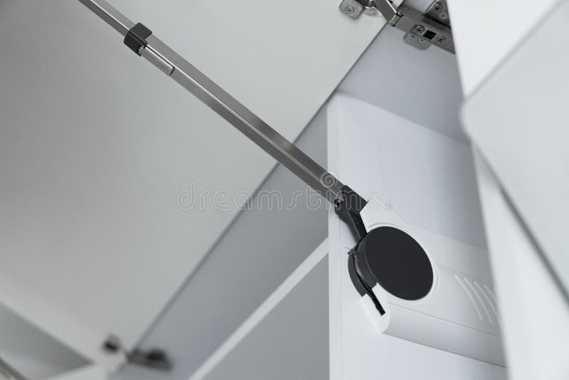 Kitchen with Open Fronts. Lift System for Bifold Fronts for