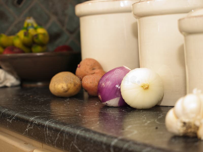 Kitchen Canisters for Potatoes, Onions, and Garlic Stock Photo Image