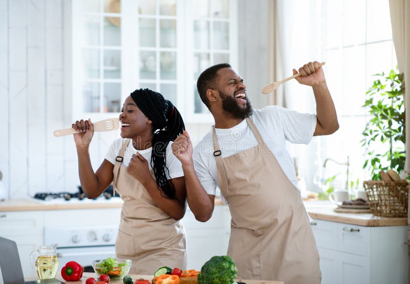 Funny Cooking. Attractive Caucasian Man In The Kitchen Stock Photo, Picture  and Royalty Free Image. Image 65857067.