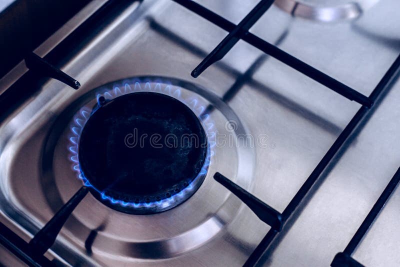 Kitchen Gas Hob, Stove Cook with Blue Flames Burning Stock Photo