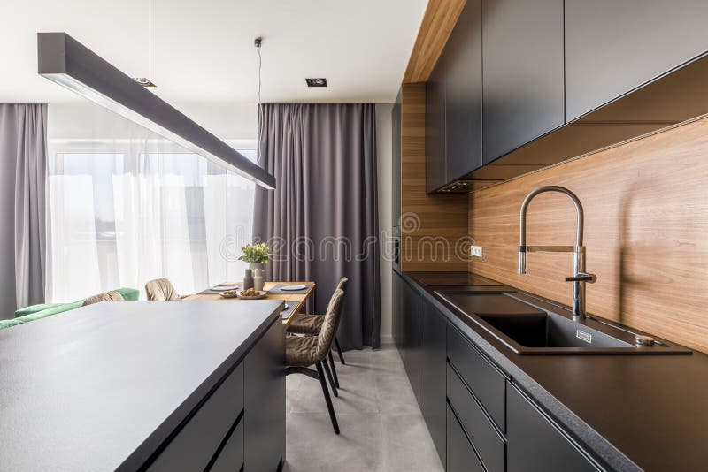 Kitchen interior with black cabinets