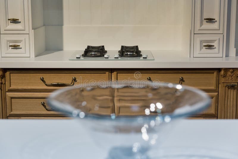 Kitchen Interior with White Gas Stove in the Distance Stock Image