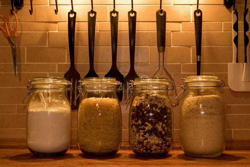 Kitchen jars for kitchen ingredients. Kitchen tools for cooking. Glass, home.