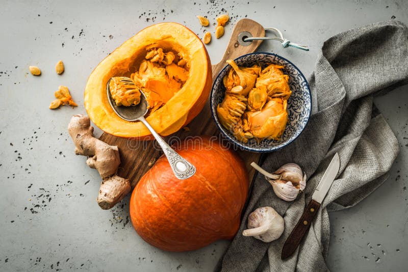 Kitchen - preparing pumpkin squash for cookin stock photos