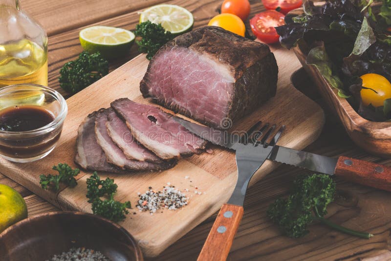 Kitchen and Roast Beef and Vegetables and Condiments Stock Photo Image of guests, fork 93846404