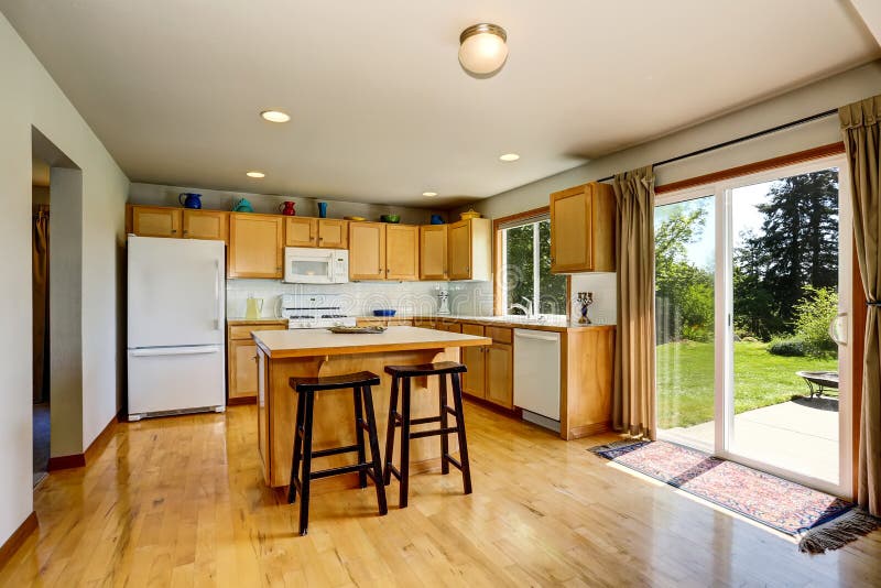 Kitchen Room Interior with Light Brown and Island. Stock Image