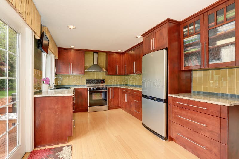 Kitchen Room Interior with Modern Brown Cabinets and Light Tones
