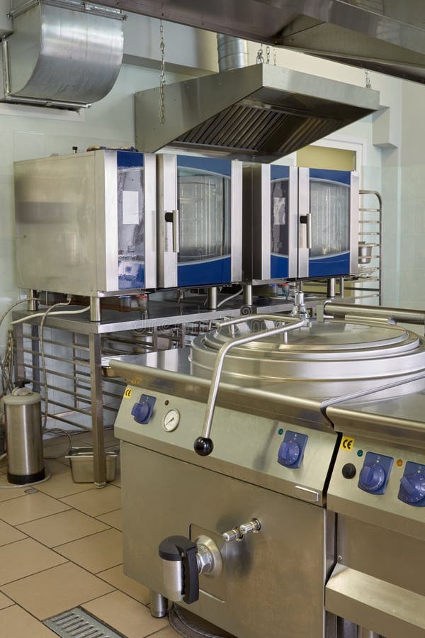 Kitchen room with modern electrical equipment in stock image
