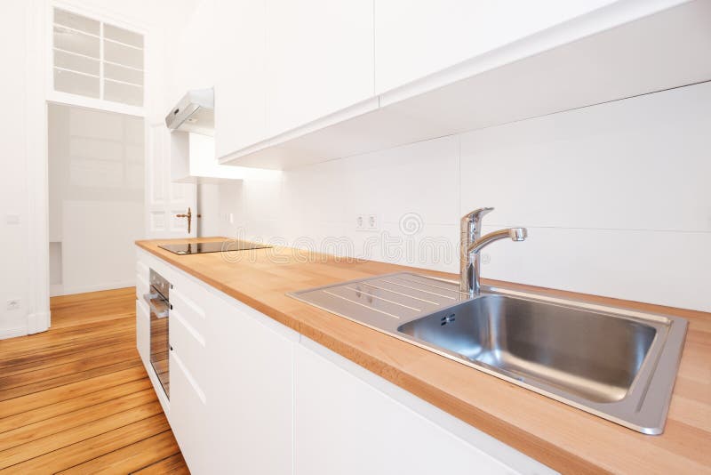 Kitchen Sink and Water Tap in New White with Wooden Worktop Stock Image Image of
