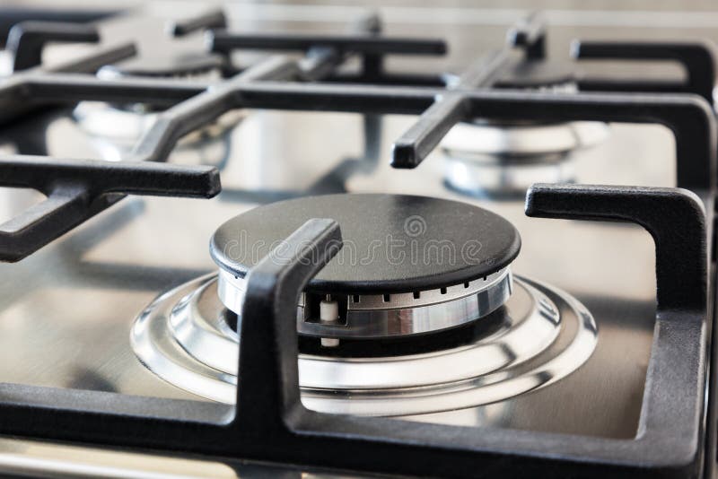 Kitchen Surface in Stainless Steel with Cast Iron Grill. View from