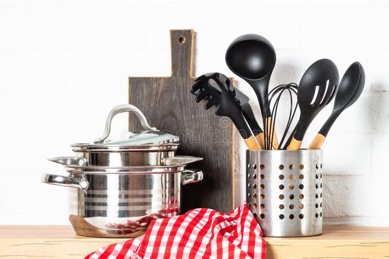 Kitchen Table, Kitchen Utensils, Cooking Pots at White Kitchen. Stock