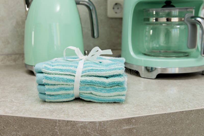 Kitchen Towels, Coffee Maker and Electric Kettle in the Interior of a