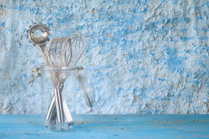 Kitchen Utensils in a Glass Jar, Stock Photo Image of equpment