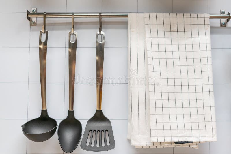 Kitchen Utensils Hanging on the Wall and Towel Stock Image Image of