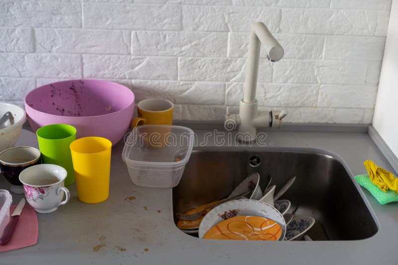 Kitchen Utensils Need a Wash Stock Photo Image of horizontal, chaos