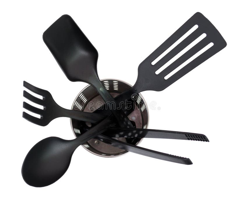 Kitchen utensils in a utensil holder isolated