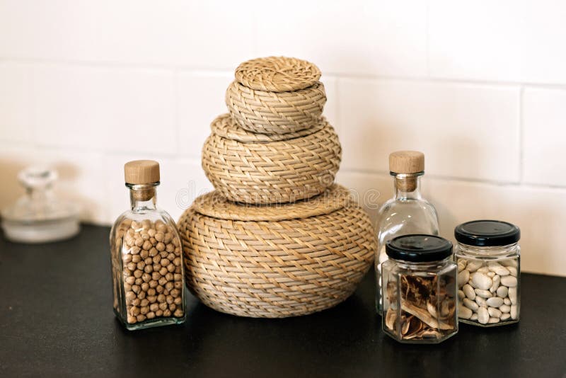 Kitchen Utensils, Wooden Wicker Baskets and Spices. Soft Selective