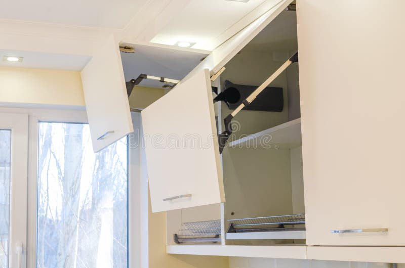 Kitchen Wall Cabinets With Mdf Facades And A Folding Opening Mechanism In Light  Beige. Stock Photo - Image Of Kitchen, Chipboard: 168924680