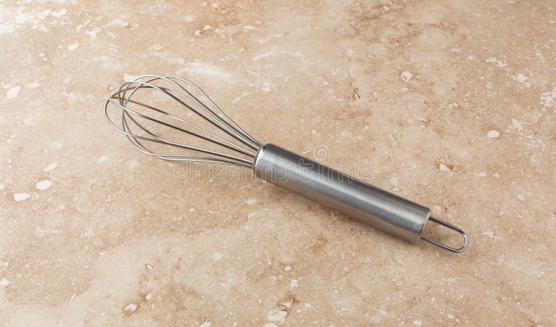 https://thumbs.dreamstime.com/b/kitchen-whisk-marble-counter-top-new-138354105.jpg